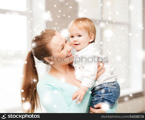 family, children, christmas, x-mas, love concept - happy mother with adorable baby