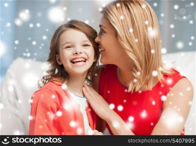 family, children, christmas, x-mas, love concept - mother and daughter cuddling