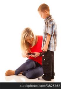 Family, children, parenthood, technology and internet concept. Mother and son playing video game on smartphone isolated on white