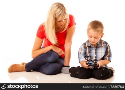 Family, children, parenthood, technology and internet concept. Mother and son playing video game on smartphone isolated on white