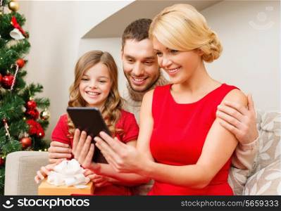 family, christmas, happiness, technology and people concept - smiling family with tablet pc