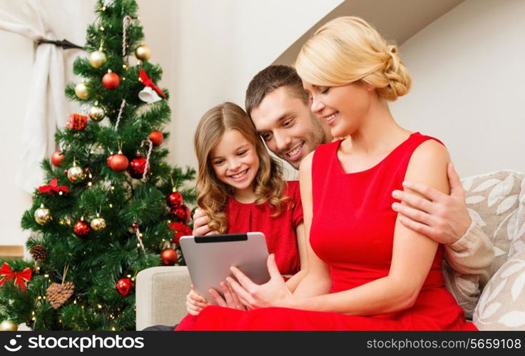 family, christmas, x-mas, technology and people concept - smiling family with tablet pc