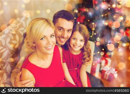 family, christmas, x-mas, winter, happiness and people concept - happy family at home