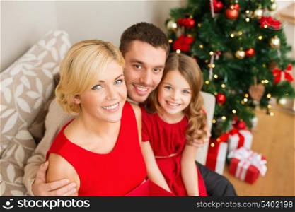 family, christmas, x-mas, winter, happiness and people concept - happy family at home