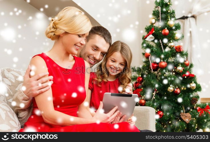 family, christmas, x-mas, winter, happiness, technology and people concept - smiling family with tablet pc