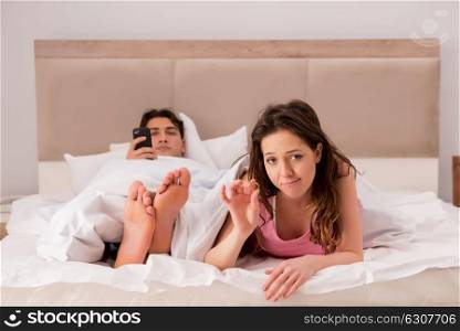 Family conflict with wife husband in bed