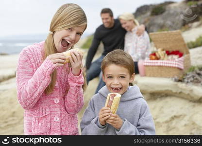 Family Dining Al Fresco At The Beach