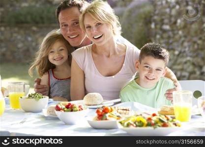 Family Eating An Al Fresco Meal