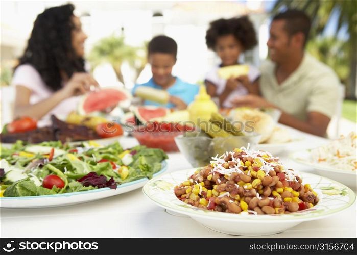 Family Eating An Al Fresco Meal