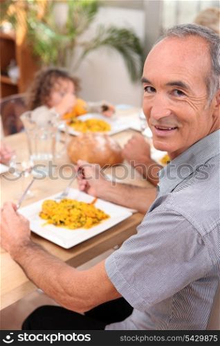 Family eating paella