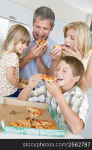 Family Eating Pizza Together