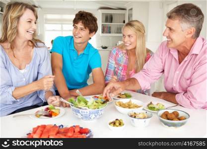 Family enjoying meal at home