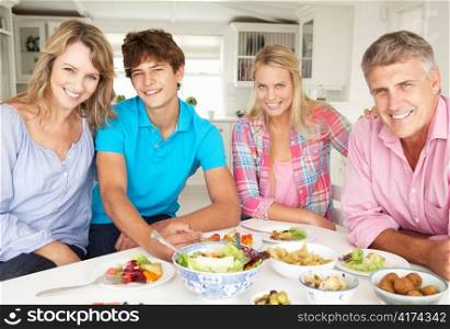 Family enjoying meal at home