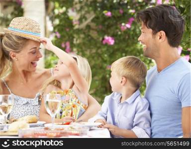 Family Enjoying Meal outdoorss