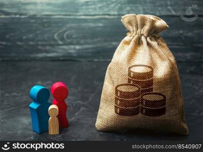 Family figurines near the money bag. Social assistance and support. Income level, budget. High debt. Segmentation. Marketing and targeting. Demographic grant. Social research, consumer preferences.