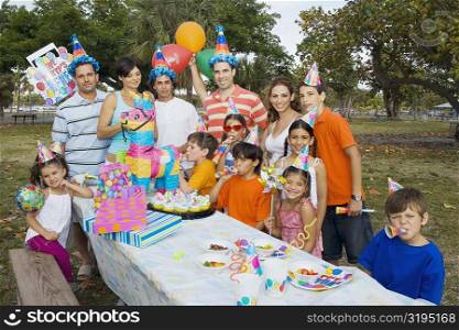 Family friends celebrating a birthday party with their children