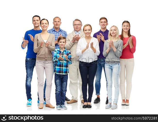 family, gender, generation and people concept - group of smiling men, women and boy applauding