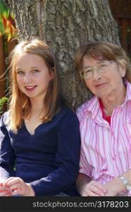 Family generations - portrait of granddaugher and grandmother