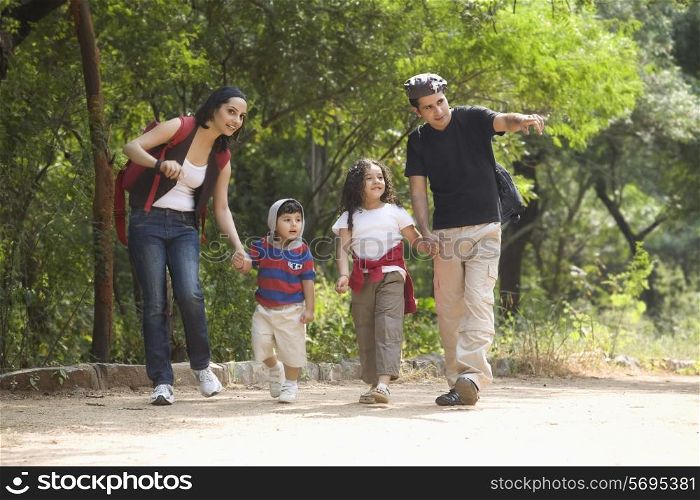 Family going for a walk in a park