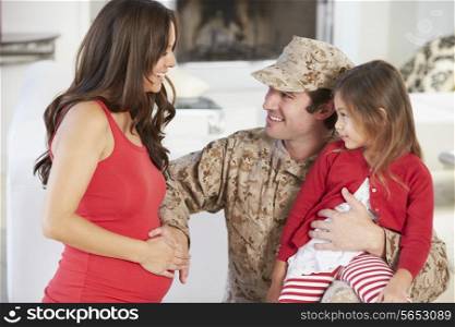 Family Greeting Military Father Home On Leave