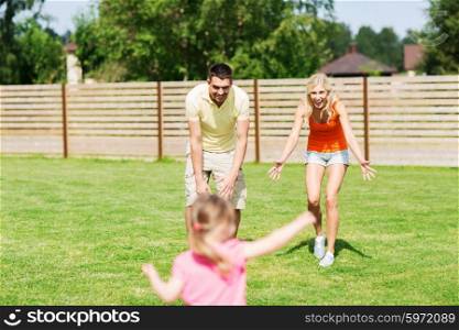 family, happiness, adoption and people concept - happy little girl running towards father and mother outdoors