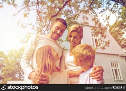 family, happiness, generation, home and people concept - happy family standing in front of house outdoors. happy family in front of house outdoors