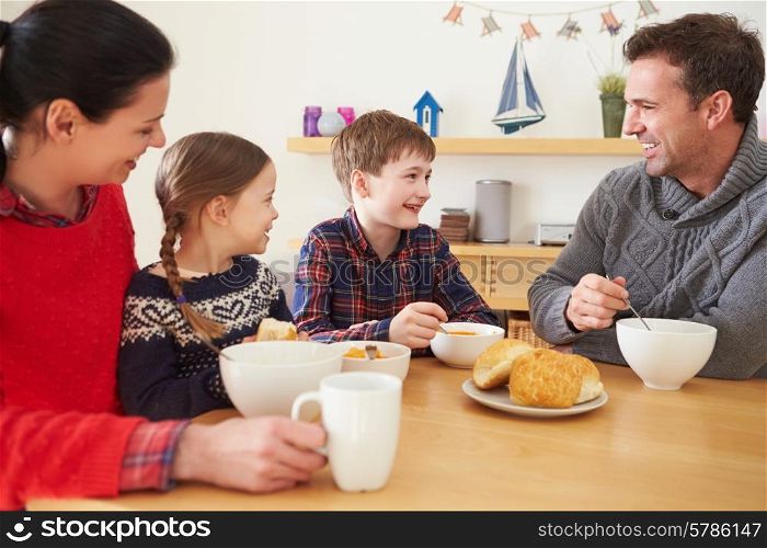 Family Having A Bowl Of Soup For Lunch