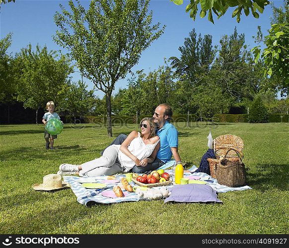 Family having a picnic in the garden