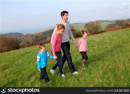 Family having a walk in countryside
