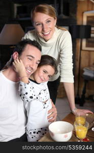 Family having breakfast together