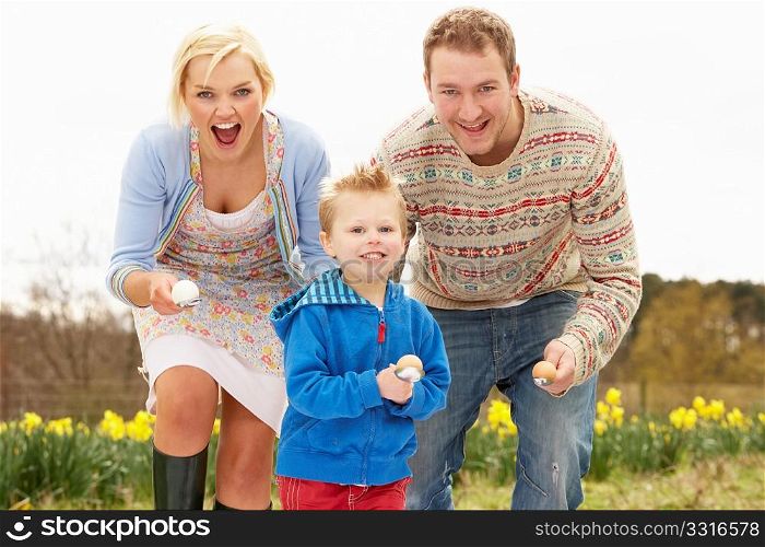 Family Having Egg And Spoon Race