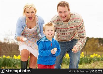Family Having Egg And Spoon Race