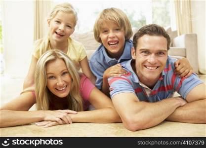 Family Having Fun At Home Together