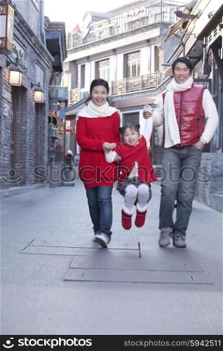Family having fun in Hutong