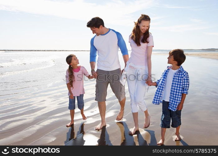 Family Having Fun On Beach Holiday