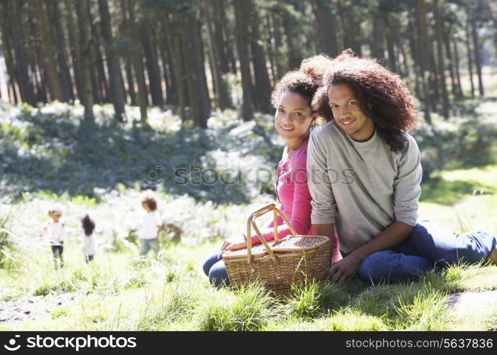 Family Having Picnic In Countryside