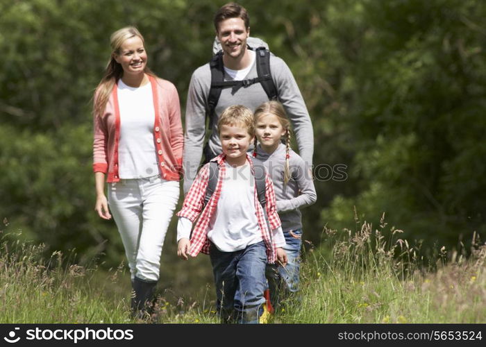 Family Hiking In Countryside