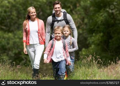 Family Hiking In Countryside