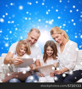 family, holidays, christmas technology and people - smiling mother, father and little girls with tablet pc computers over blue snowy background