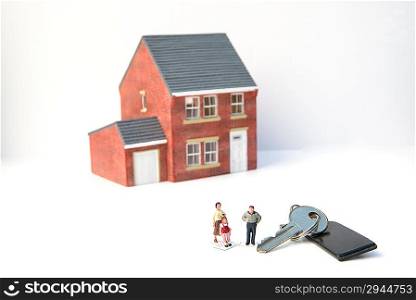 Family home concept with model house and people on white background