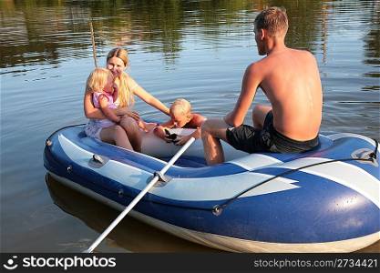 Family in an inflatable boat