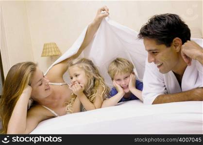 Family in bed