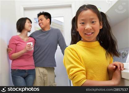 Family in Laundry Room
