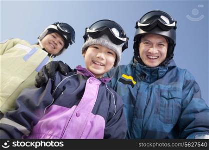 Family in Ski Resort, low angle view portrait