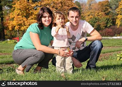 family in the park in autumn