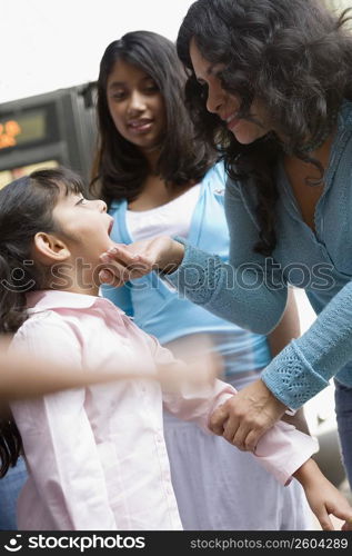 Family in urban setting, Los Angeles, California