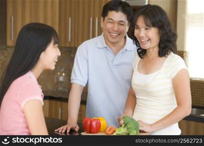 Family Laughing While Preparing meal,mealtime