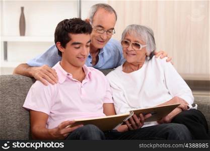 Family looking through photo album