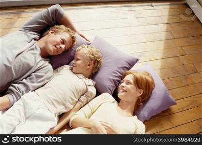 Family lying on floor