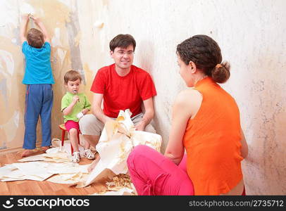 family makes interruption in removal of wallpapers from wall